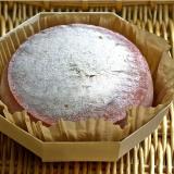 Pavin cheese in a wooden container