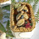 Chicken liver, blueberry and red currant terrine in a wooden mold
